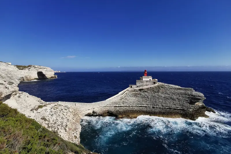 White limestone cliffs and the Madonetta lighthouse at Bonifacio, Corsica