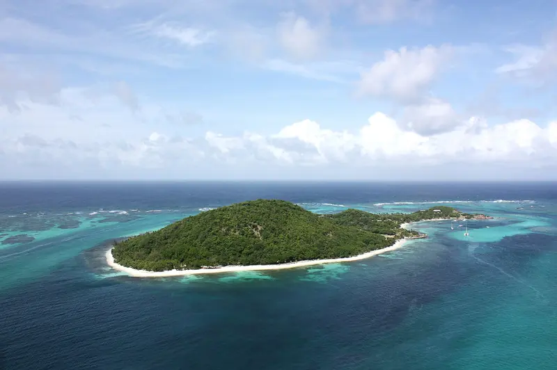 Aerial view of Petit St. Vincent and its reef in the Grenadines
