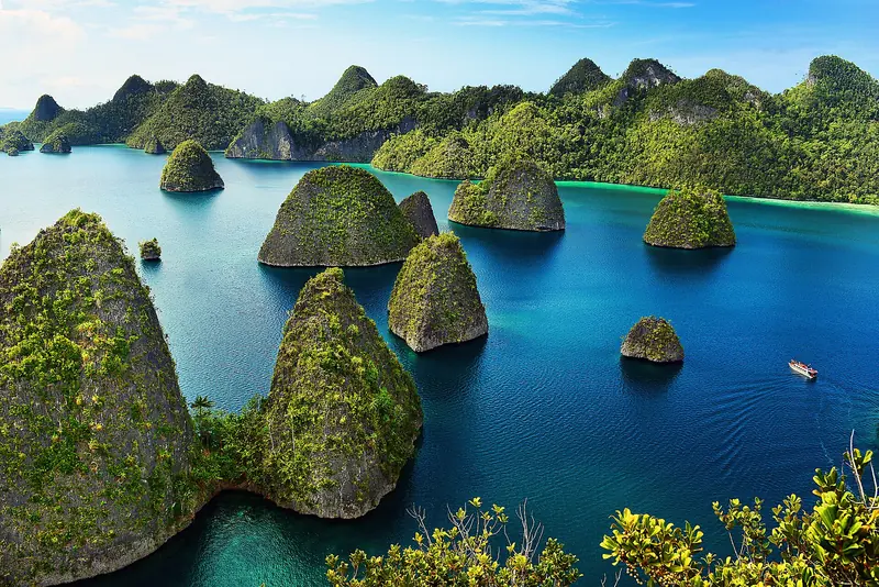Karst islands rising from the lagoon of Wayag, Raja Ampat, Indonesia