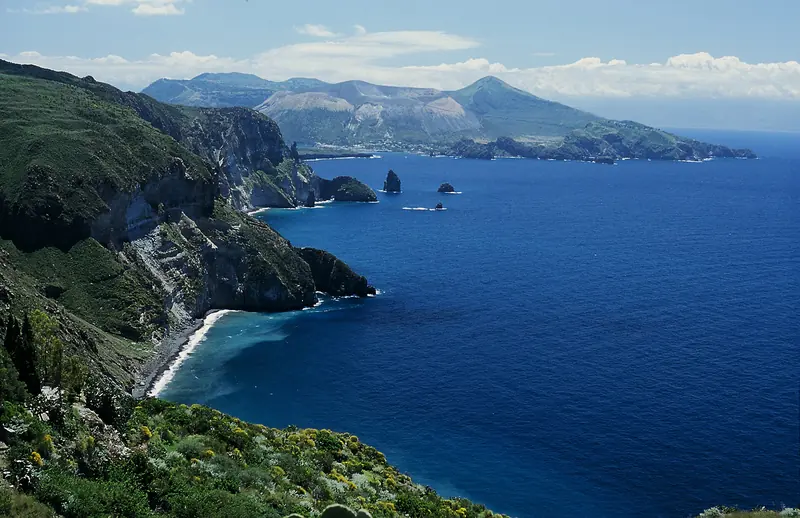 The coast of Lipari looking across to Vulcano in the Aeolian Islands, Sicily
