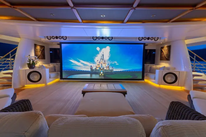 Outdoor cinema on the deck of a superyacht at night