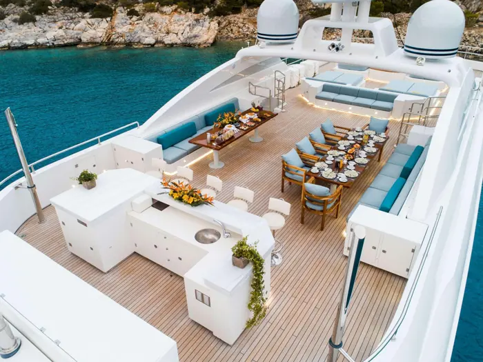 Aerial view of sundeck dining on a superyacht