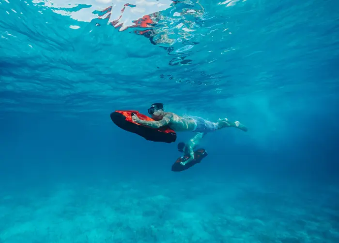 Guest gliding underwater on a Seabob